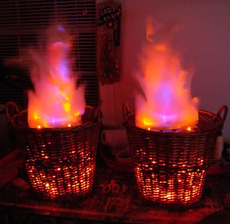 Haunt Your House: 18 Ideas to Create the Spookiest Place on the Block Fire Baskets, Cheap Halloween Diy, Fake Fire, Cheap Diy Halloween Decorations, Table Halloween, Haunted House Ideas, Fire Basket, Casa Halloween, Vbs Ideas