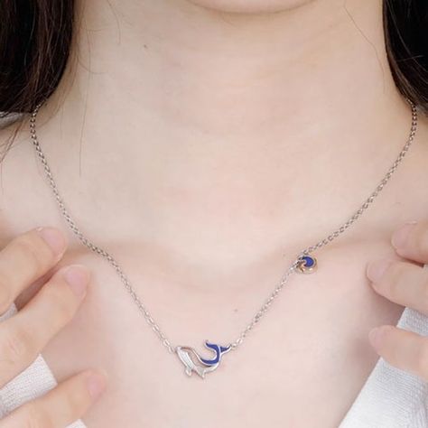 This elegant whale-themed silver necklace features a detailed whale pendant with blue and gold accents. Perfect for ocean lovers, it combines durability and style, making it an ideal gift. #Jewelry #WhaleLover #OceanThemed Whale Pendant Necklace, Whale Pendant, Ocean Lover, Gift Jewelry, Blue And Gold, Gold Accents, Ideal Gift, Silver Necklace, Pendant Necklace