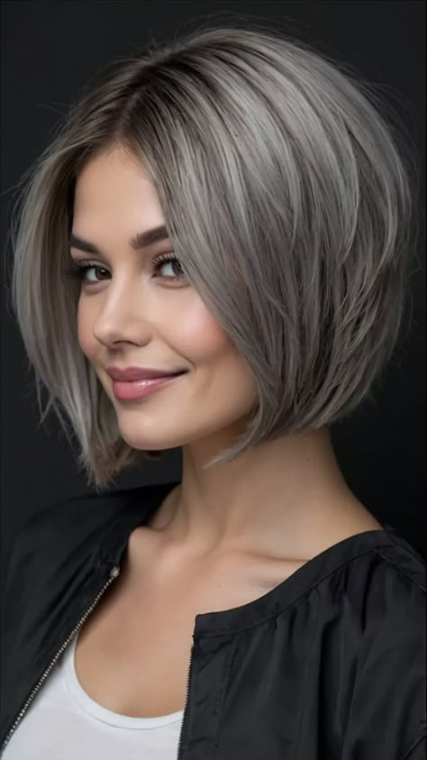 Dazzling in Grey: 15 Bob Hairstyles That Define Style 37 Chin Length Bob Grey Hair, Black Hair With Grey Highlights Short, Grey Blending Highlights Dark Brown Short Hair, Silver Bobs, Black Hair With Grey Highlights, Medium Wavy Bob, Ash Highlights, Silver Bob, Short Dark Brown Hair