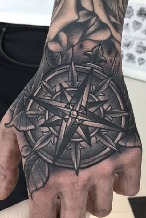 150 Trendy Hand Tattoos for Men You Must See - Tattoo Me Now Compass Hand Tattoo, Hand Tattoo Cover Up, Back Of Hand Tattoos, Fist Tattoo, Tattoo Main, Cover Up Tattoos For Men, Herren Hand Tattoos, Compass Rose Tattoo, Skull Hand Tattoo