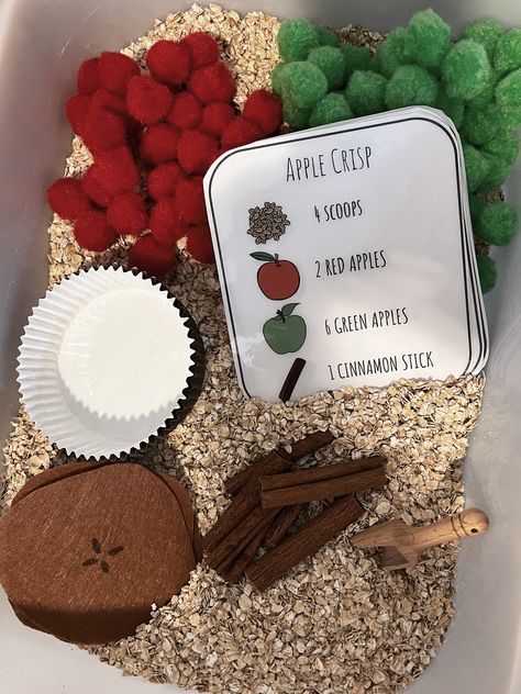 A fun educational sensory bin for your little! Sensory bin comes prepared with all your little needs to create their apple pie and apple crisp using a variety of instruction cards. Apples Sensory Bin, August Sensory Bin Preschool, Elmo Sensory Bin, About Me Sensory Bin, Rain Sensory Bin, Pre K Sensory Bins, Oatmeal Sensory Bin, Prek Sensory Table Ideas, Sensory Apple Activities