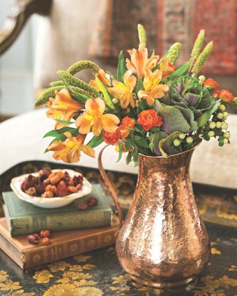 Perfect for #autumn we love the timeless beauty and warmth #copper accents like this Hammered Mules pitcher bring to a space. How do like to welcome #fall to your home? by victoriamagazine Copper Pitcher Decor, Copper Containers, Dish Photography, Everyday Centerpiece, Copper Vases, Copper Pitcher, Pitcher Decor, Raindrops And Roses, Victoria Magazine