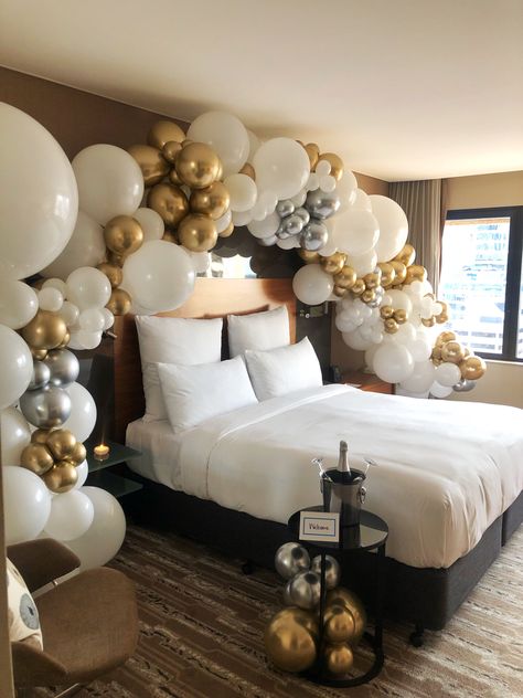 More stunning styling from @alysiabridgerevents, gold and silver balloons, hotel room balloons, balloon garland, bedroom balloons Balloon Hotel Decorations, Bedroom Balloon Decoration, Hotel Balloon Decoration, Bridal Hotel Room Decor, Wedding Hotel Room Decorations, Engagement Hotel Room Decorations, Hen Party Decorations Hotel Room, Hotel Room Balloons, Nye Hotel Room Decor