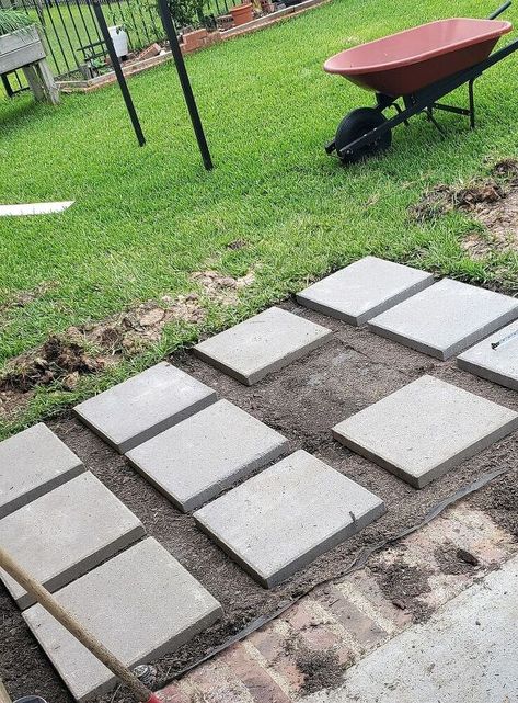 After we extended our patio in 2017 we realized that we had everything EXCEPT a {semi-}permanent home for the grill.We didn't want a patio that spanned the length of our home or anything that couldn't be changed later if we wanted to.In our previous home we extended our patio with pavers Patio Grill Area Ideas, Grilling Pad Off Patio, Bbq Pad Ideas, Grill Landing Pad Ideas, Pavers For Grill Area, Extending Concrete Patio With Pavers, Paver Patio With Grass In Between, Grill Pad Off Patio, Patio Extension Ideas On A Budget