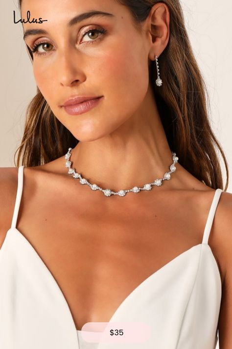 Any occasion that calls for the Lulus Elevated Luxury Silver Rhinestone Pearl Necklace and Earring Set is sure to be a glamorous and memorable event! This stunning jewelry set starts with a dazzling silver necklace that features a series of rhinestone-embellished medallions with shiny faux pearl centers. The matching earrings boast a drop silhouette with slender chains accented with clear rhinestones and the same eye-catching medallions at the ends for a posh finish. Necklace Has A Lobster Clasp Pearl Necklace And Earring Set, Pearl Necklace And Earrings, Necklace And Earring Set, Accessories Jewelry Necklace, Silver Rhinestone, Stunning Jewellery, Necklace And Earrings, Clear Rhinestones, Matching Earrings