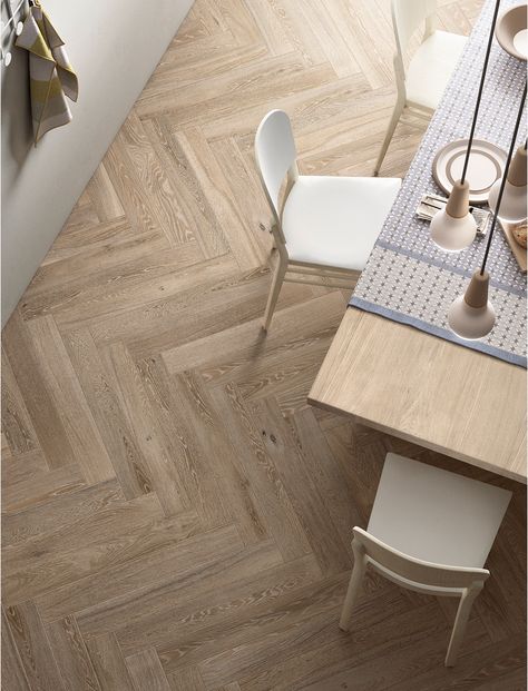 Herringbone pattern is really trendy this year. Subway tiles, which are all the rage, can be lined up into chevrons for added movement. Fake Wood Flooring, Wood Floor Stain Colors, Faux Wood Flooring, British Homes, Fake Wood, Interlocking Deck Tiles, Modern Flooring, Wood Tile Floors, Wood Effect Tiles