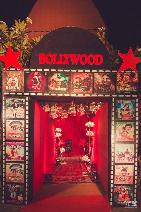 Photo of Bollywood theme sangeet entrance decor idea Bollywood Retro Theme Party Decoration, Bollywood Theme Party Decoration, Bollywood Theme Wedding, Retro Theme Party Decoration, Retro Bollywood Theme, Bollywood Party Decorations, Retro Theme Party, Bollywood Night, Bollywood Theme Party