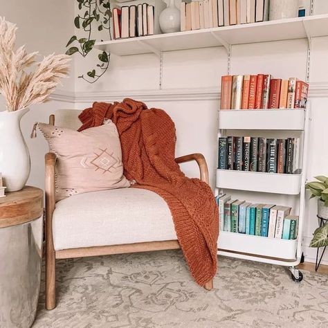 Reading Nook with Books on rolling metal cart via @lauren.m.mills Book Corner Apartment, Cozy Reading Corners Living Room, Reading Corner Bookshelf, Book Corner Ideas Bedroom Cozy Nook, Book Reading Corner Ideas, Cozy Reading Nook In Bedroom, Cozy Bedroom Reading Corner, Reading Corner Bedroom Adult, Cosy Corner Ideas