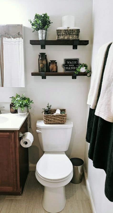 Apartment Bathroom Inspiration Modern, Black White Tan Bathroom Ideas, Small Half Bathroom Farmhouse, Black White And Wood Bathroom Decor, Gray White And Black Bathroom Decor, Brown Bathroom With Black Accents, Small Bathroom Ideas With Black Accents, Modern Bathroom Decor Black And White, Modern Small Bathroom Design Ideas Black And White