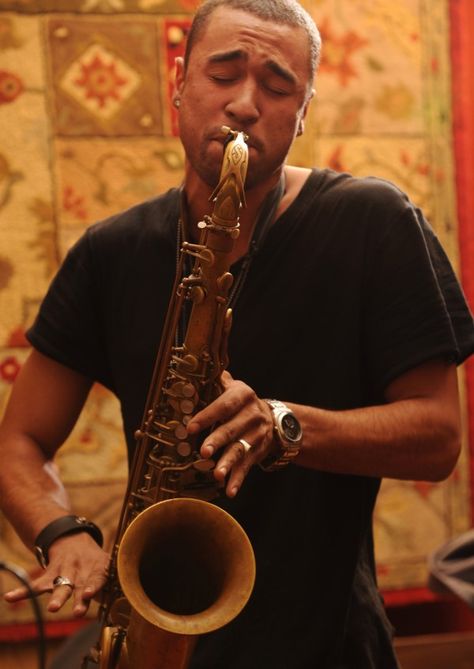 This is a picture of Malcolm playing is saxophone getting ready for a concert with his band. Poses With Saxophone, Person Playing Saxophone, Musician Photos, Playing Saxophone, Photography Reference, Books Inspiration, Saxophone Player, Saxophone Players, Reference Drawing