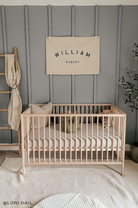 Planning a baby nursery and looking for some nursery ideas? What better plsce to start than an adorable nursery accent wall! Cozy up bc we've rounded up the best neutral nursery accent walls, with ideas for both boys and girls - from boho to minimalist, earthy and beyond. (Including great ideas for nursery decor, nursery furniture, and some super cute baby room themes for inspiration!) Neutral Nursery Feature Wall, Paneled Walls Nursery, Paneling In Nursery, Light Brown Accent Wall Nursery, Nursery Accent Wall Neutral Paint, Kids Accent Wall Ideas, Nursery Trim Wall, Nursery Stencil Wall, Taupe Accent Wall Nursery