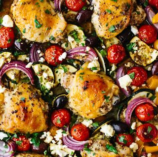 Sheet pan chicken with feta, tomatoes and olives Chicken With Feta And Olives, Mediterranean Chicken With Olives, Greek Chicken Sheet Pan Recipes, Greek Sheet Pan Chicken, Greek Sheet Pan, Mediterranean Chicken Bake, Chicken Recipes With Tomatoes, Mediterranean Chicken Recipes, Sheet Pan Meals Chicken