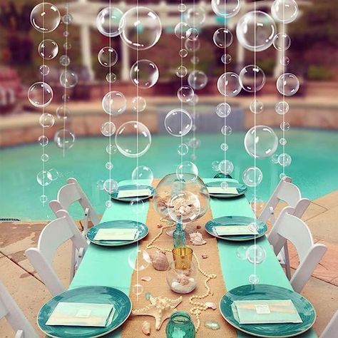 Create a whimsical undersea atmosphere at your next pool party with the vibrant Party Decorations 2D Bubble Cut Out Garland! Hang these playful hanging streamers featuring underwater bubbles and watch the party come alive. Perfect for poolside celebrations and summer gatherings, this decoration will add a touch of magic to your event! #afflink Bubble Garland, Ocean Birthday Party, Mermaid Birthday Party Decorations, Bubble Birthday, Mermaid Party Favors, Bawah Air, Ocean Birthday, Bubble Party, Sea Baby Shower