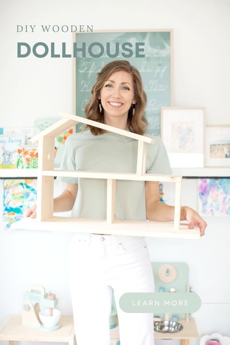 Check out these free plans for our $27 DIY wooden dollhouse! A simple handmade dollhouse that you can build during naptime! A simple wooden dollhouse that is so fast to build! This is a very Montessori approach to dollhouses and toddler learning as it is simple, natural, and versatile! Or, your can customize it with paint and stain. Simple Wooden Dollhouse Diy, Wood Dollhouse Diy, Simple Wooden Dollhouse, Diy Dollhouse Plans Free Printable, Montessori Wooden Toys Diy, Dollhouse Shelf Diy, Simple Diy Dollhouse, Diy Small Doll House, How To Build A Doll House Diy