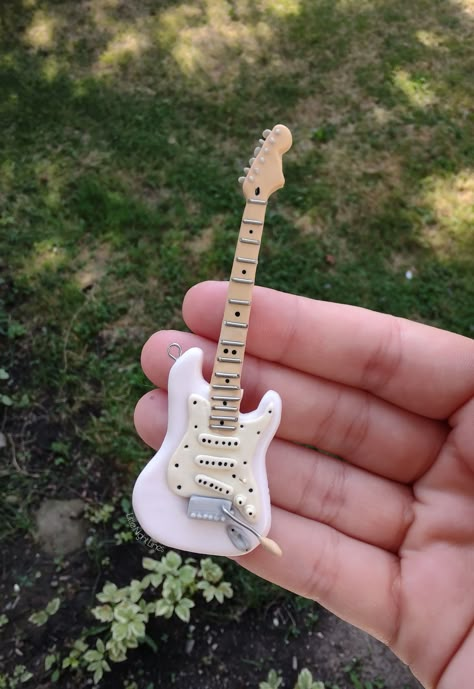 🎸 Made this custom guitar for a long time friend! For more custom designs and handcrafted items check out my shop LittleNightLines @ Etsy! Guitar Clay Art, Polymer Clay Guitar, Clay Guitar, Ceramic Guitar, Clay Diy Projects, Long Time Friends, Custom Guitar, Clay Figures, Polymer Clay Charms