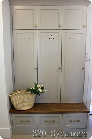 mudroom lockers with hole vents Entry Way Lockers, Mudroom Cubbies, Wood Lockers, Built In Lockers, Mudroom Cabinets, Mud Room Entry, Mudroom Lockers, Wood Garage Doors, Mudroom Laundry Room