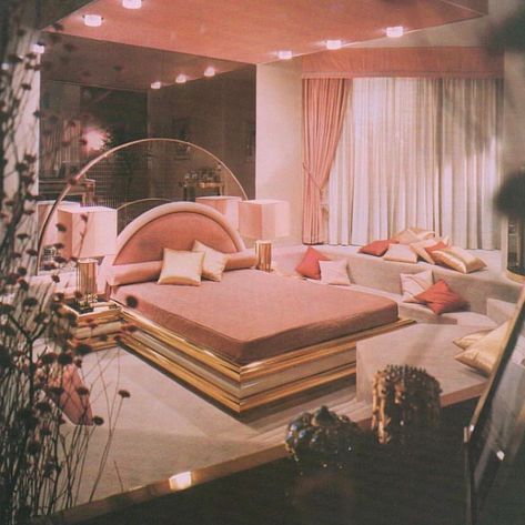 ◽️The 80s Interior◽️ on Instagram: “A mirrored peach and gold bedroom of dreams - one carpeted step at a time! . (Architectural Digest - 1982) . via @adorauxx - originally…” Bedrooms From The 80s, 80s Decor Interior Design, 1980s Luxury Interior, 80’s Bedroom, 80s Hotel Room, 80s Pink Interior, 80s Luxury Interior Bedroom, 80s Bedroom Ideas, 70s Bedroom