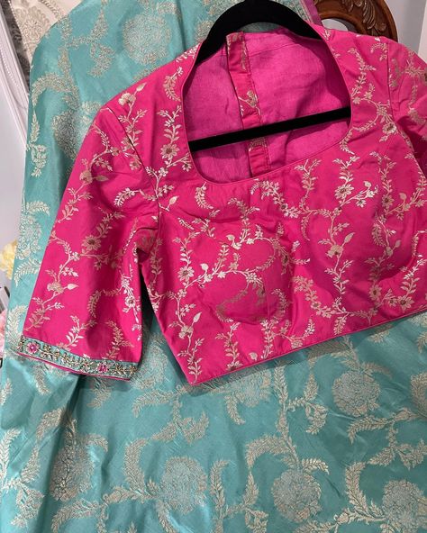 Sold Banaras Katan Silk Saree paired with pure Banaras silk contrast blouse with handwork on hands border. This trendy blouse in pink contrast with teal blue Banaras saree is certainly a beautiful pairing! Available to ship immediately within USA Please DM to order #banaras #banarasi #saree #sareelove #fashion #instafashion #swaraexclusivebyswathi #sarees Pink Banarasi Saree Contrast Blouse, Banarasi Blouse Design Back, Pista Saree, Plain Blouse Designs, Maggam Blouse, Banaras Sarees, Cotton Blouse Design, Blouse Designs Catalogue, Pink Contrast