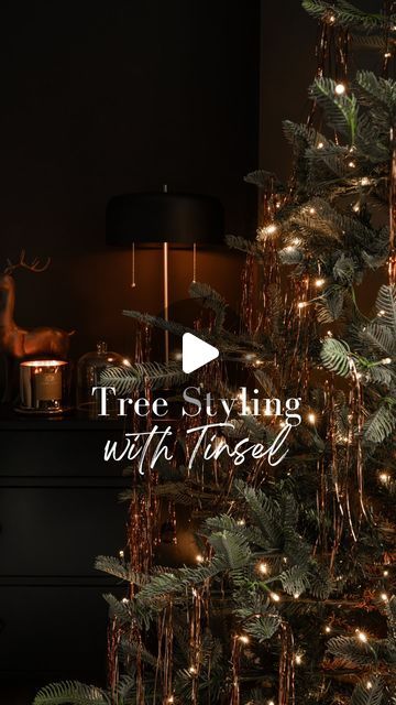 Thomas Trust | Modern Interiors & Menswear on Instagram: "Tinsel trees have been making a comeback and I’ve tried it enough times to share some tips! Loving this bronze tinsel from @cb2 for a moody Christmas twist. The way it pops off the warmth of my brown color scheme? Gorge. ✨ Let me know what you think below! ⬇️" Trees With Tinsel, Black Bronze Christmas Tree, Forest Christmas Aesthetic, Brown And Green Christmas, Black Green Copper Christmas Tree, Tree With Tinsel, Gold Tinsel Tree, Christmas Tree Ideas Bronze, Gold Tinsel Christmas Tree