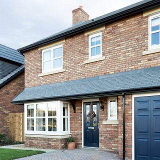 Take a tour of this Middlesbrough new-build | Ideal Home Front Porch Seating Area, Porch Seating Area, Landscaping Front Porch, Bay Window Seating Kitchen, Front Porch Landscaping, Bay Window Exterior, Porch Seating, Front Porch Seating, Porch Extension