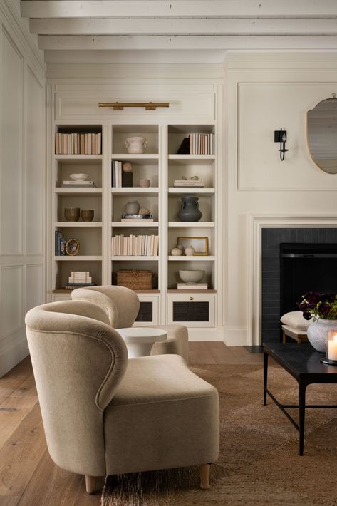 How to Style Built-in Cabinets - Studio McGee Amber Interiors Bookshelf Styling, Built In Look Bookshelves, Built In With Desk Living Room, Display Built In Cabinets, Modern Traditional Interior Design Style, Amber Interiors Built In Shelves, Window Seat With Built In Bookcases, Traditional Built In Bookshelves, Foyer Built In