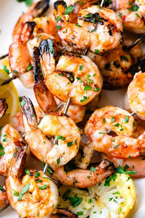 This super easy grilled shrimp recipe with garlic butter is a family favorite and a win-win for busy weeknights! #shrimp #grilled #dinner #protein #easyrecipes #glutenfree #sumerrecipes Summer Grilling Ideas, Easy Grilled Shrimp Recipes, Summer Shrimp Recipes, Grilled Shrimp Recipe, Dinner Protein, Shrimp Grilled, Shrimp Skewer Recipes, Meals Pasta, Recipe With Garlic