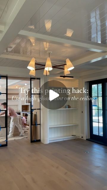 Andrea Goldman on Instagram: "Save this hack for your next painting project. To make the space feel brighter and the ceilings taller, we added a high gloss ceiling detail to help reflect light. 
.
.
.
Interior design, paint, home ideas, home hacks, living room design, interior designer" High Gloss Painted Ceiling, High Gloss Ceiling Paint, How To Make Short Ceilings Look Taller, High Gloss Ceiling, Gloss Ceiling, Light Interior Design, Blue And White Rug, Mid Century Ceiling, Ceiling Detail