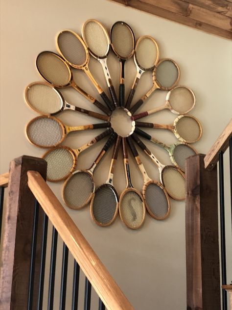 Thanks to ideas on Pinterest and my collection of old rackets, my new home has a little more personality. Bicycle Ideas Decoration, Repurpose Tennis Racket, Decorating With Tennis Rackets, Wooden Tennis Racket Decor, Old Tennis Rackets Ideas, Vintage Tennis Racket Decor, Tennis Racket Display, Vintage Display Ideas, Tennis Racquet Decor