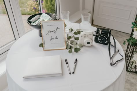 Wedding Polaroid Guest Book Station, Instax Camera Wedding Guest Books, Polaroid Photo Table Wedding, Guest Book Station Wedding, Wedding Photo Corner Decor, Wedding Reception Polaroid Table, Polaroid Camera Station Wedding, Modern Wedding Guest Book Table, Polaroid Guest Book Wedding Table