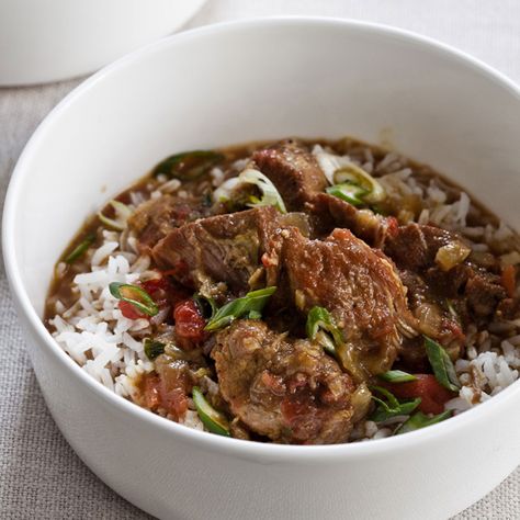 Grace Parisi cooks pork shoulder with bold ingredients like fresh ginger, garlic, curry powder, cumin and turmeric. The flavors intensify and penetrat... Coconut Pork, Pork Curry, Slow Cooker Pork, Pork Shoulder, Curry Recipe, Pork Dishes, Slow Cooking, Stew Recipes, Curry Recipes