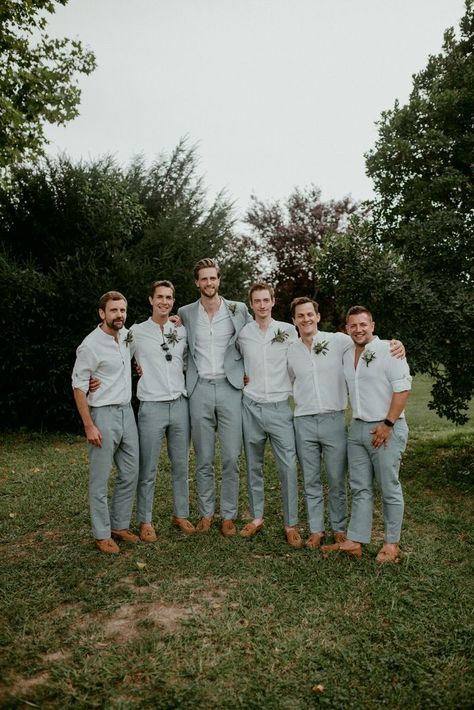 Contrasting Groom And Groomsmen, Grey Men’s Suit Wedding, Mens Wedding Attire For Big Guys, Groomsmen Suits White, Grey Groomsmen Attire Casual, Summer Wedding Outfit Groomsmen, Groomsmen Outfit Ideas Grey, Wedding Suits Groom Casual, Dusty Blue Wedding Groomsmen Suspenders