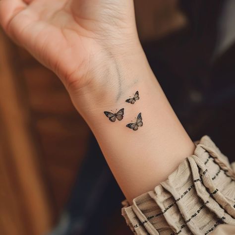 Cute butterfly tattoo ideas. Check me profile ⬆️ for more tattoo design ideas . . . . . . . . . . #reelsart #instagramart #tattooartist #tattooist #butterflytattoo #cutetattoo #cutetattooideas #cutetattoodesigns #tattooideas #tattoodesignideas Butterfly Band Tattoo, The Wrist Tattoo, Me Profile, Butterfly Tattoo Ideas, Meaningful Wrist Tattoos, Butterfly Wrist Tattoo, Shin Tattoo, Compass Tattoo Design, Flower Wrist Tattoos