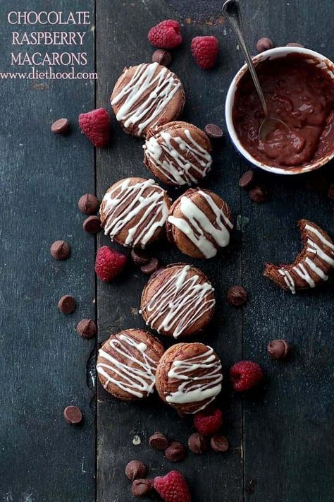 Chocolate Raspberry Macarons | www.diethood.com | Sweet, chocolaty, meringue-based sandwich cookies filled with a smooth and silky raspberry chocolate ganache. | #macarons #chocolate #BakeWithGhirardelli Chocolate Raspberry Macarons, Magic Chocolate Cake, Raspberry Macarons, Sandwich Cookies Filling, Raspberry Chocolate, French Macaroons, Macaroon Recipes, Raspberry Filling, Macaron Recipe