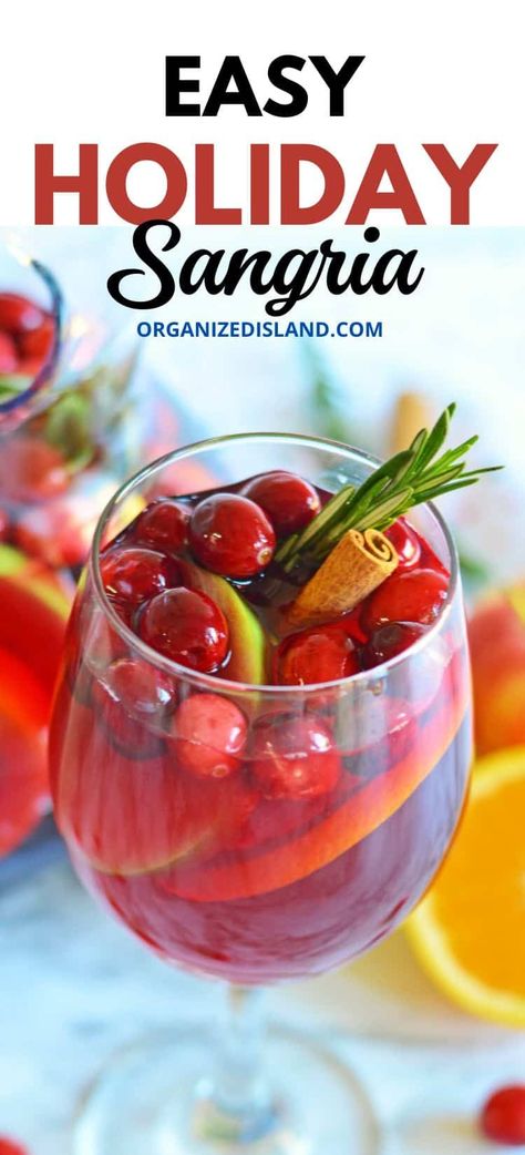 A delicious Holiday Sangria recipe to enjoy the season! Celebrate all the flavors of the holiday season with this delicious festive cocktail recipe!. Full of fruit flavors, this homemade Sangria recipe is the perfect signature cocktail for your holiday party. Sangria Recipes With Triple Sec, Sangria With Triple Sec Recipes, Red Christmas Sangria Recipe, Sangria Holiday Recipes, Xmas Sangria Recipe, Spiced Rum Sangria, Fireball Sangria Recipe, Easy Holiday Sangria, Non Alcoholic Christmas Sangria