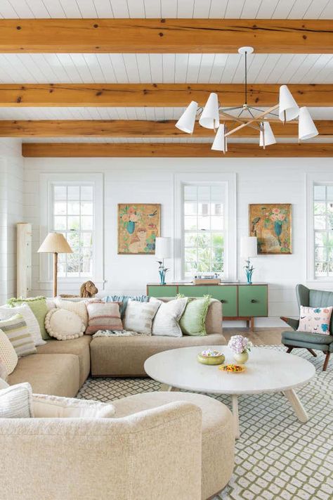 House With Pops Of Color, Airy Living Room Decor, Light Airy Living Room, Hanging Porch Bed, Cortney Bishop, Airy Living Room, Beach House Tour, Island Beach House, Cozy Breakfast Nook