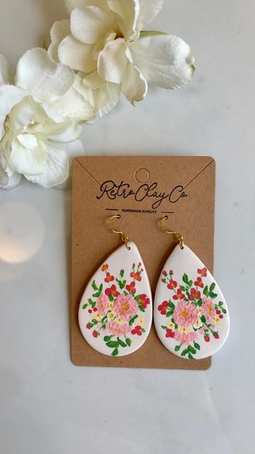 Polymer Clay Earrings on Instagram: "💐Calling all brides and floral lovers! I am going to be adding custom painted bouquets to the shop. These are such a sweet way to remember your wedding bouquet and would make a very special gift to surprise someone with. I’m also hoping to add more custom options soon. Stay tuned! 💐 . . . . #polymerclayearrings #clayearrings #clayearringscollection #handpaintedearrings #handpaintedjewelry #artreels #reelsinstagram #trendingreels #trendingaudio #customjewelr Polymer Clay Wedding, Painted Polymer Clay, Custom Bouquet, Hand Painted Earrings, Hand Painted Jewelry, Earrings Polymer Clay, Polymer Clay Charms, Wedding Anniversary Gift, Custom Bridal