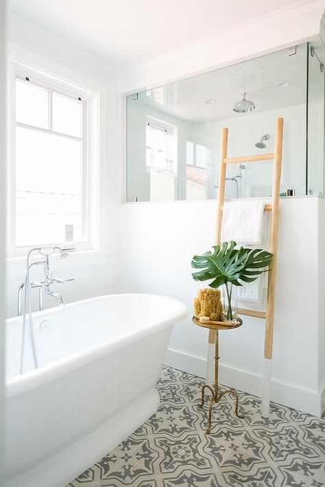 Finish a white bathroom design with ivory and gray mosaic floor tiles to set a dynamic and fun pattern to the room. Green Master Bath, Open Bathroom Concept, Shower Privacy, Half Wall Shower, Modern Boho Bathroom, Beautiful Master Bathrooms, Privacy Wall, Open Bathroom, New Bathroom Ideas