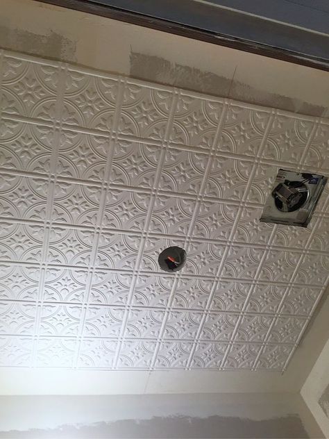 How to Dress Up Your Ceilings With Faux Tin Ceiling Tiles DIY Ceiling Tile Replacement Ideas, Vinyl Ceiling Tiles, Ceiling Ideas For Bathroom, Ceiling Tin Tiles Ideas, Tin Ceiling Bathroom, Peel And Stick Ceiling Tiles, Tin Ceiling Tiles Kitchen, Cottage Ceilings, Kitchen Ceiling Tile