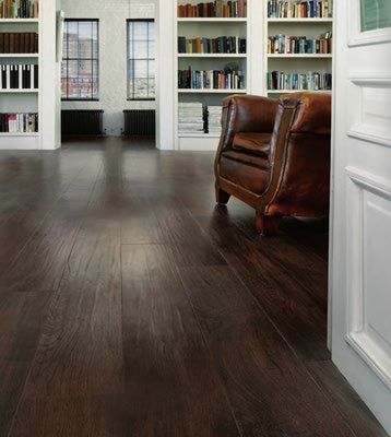 vinyl flooring that looks like dark wood | Luxury Vinyl Flooring: It's Stone, It's Wood, It's Whatever It Wants ... Best Flooring For Basement, Basement Flooring Options, Design Hall, Hardwood Floor Colors, Luxury Vinyl Tile Flooring, Vinyl Tile Flooring, Wood Floors Wide Plank, Flooring Inspiration, Luxury Vinyl Plank Flooring