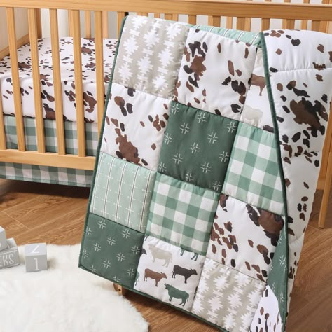 PRICES MAY VARY. Shades of green, brown and white seamlessly blend modern farmhouse with traditional elements to add a touch of rustic flair to your baby boy or girl nursery. This gender neutral baby bedding set includes a reversible crib comforter, fitted crib sheet, and a dust ruffle. The crib comforter is reversible and features a forest green patchwork design with a cow print reverse side that matches the crib sheet. The cow print fitted crib sheet is designed to fit a standard size crib mat Western Nursery Baby Boy Dbc Baby Bedding Co., Baby Boy Room Bedding, Baby Boy Nursery Themes Target, Baby Boy Crib Bedding Sets Grey, Buffalo Crib Bedding, Forest Green Crib Bedding, Gender Neutral Baby Bedding Sets, Rustic Baby Boy Nursery Furniture, Boy Nursery Themes Target