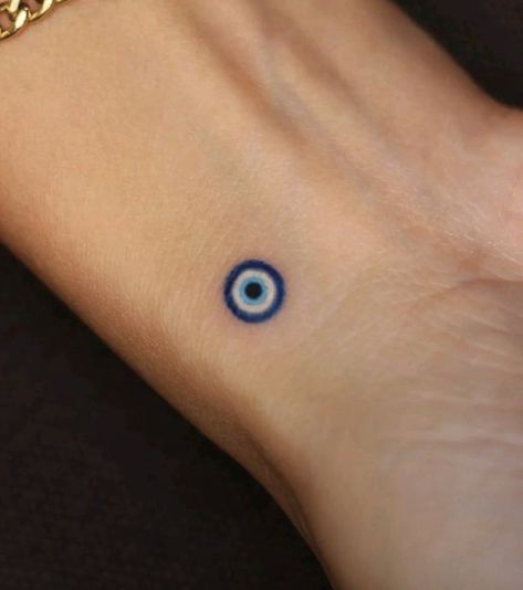 Eye On Wrist Tattoo, Small Greek Tattoo Ideas, Maddy Perez Evil Eye Tattoo, Nazar Tattoo Design, Evil Eye Best Friend Tattoo, Mini Women Tattoos, Evil Eye Bracelet Tattoo For Women, Evil Eye Stick And Poke, Evil Eye Wrist Tattoos For Women