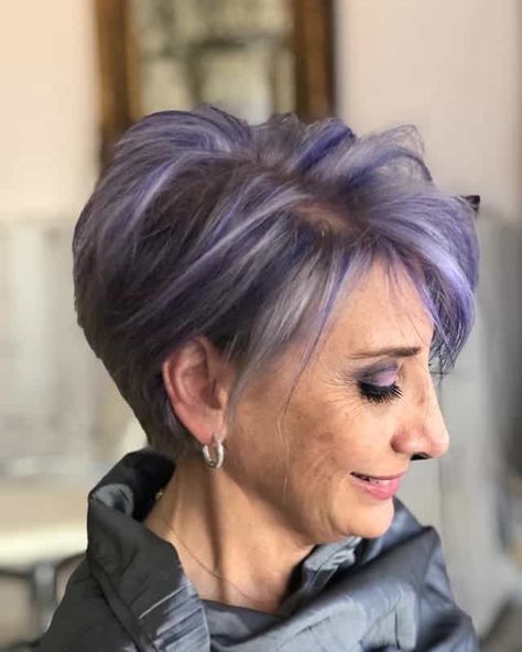 30 Striking Purple Hair Colors Trending in 2023 Purple Hair Over 50 For Women, Short Hair With Purple Underneath, Grey With Purple Hair, Grey Hair With Colored Highlights, Short Gray Hair With Purple Highlights, Silver Hair Purple Highlights, Grey Hair With Lavender Highlights, Color Streaks In Gray Hair, Silver With Purple Highlights