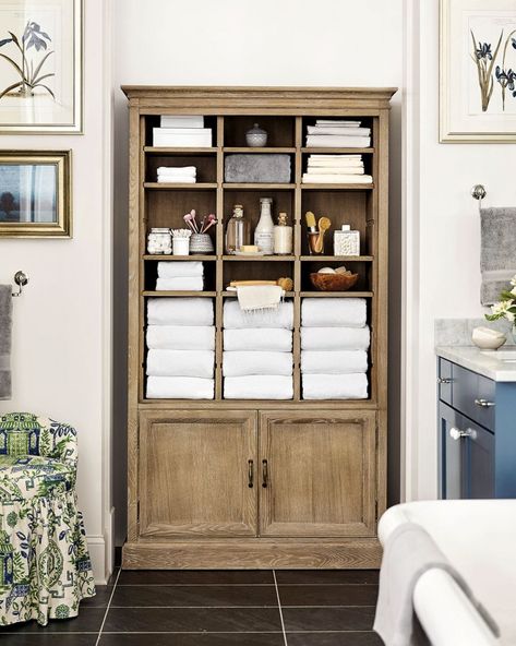 Ballard Designs oak Beckett cabinet used in a master bathroom with fluffy towels, bed linens, and toiletries Modern Bed Linen, Aesthetic Bathroom Decor, 20 Aesthetic, Farmhouse Side Table, Bed Linen Design, Aesthetic Bathroom, Fluffy Towels, White Linen Bedding, Linen Cabinet