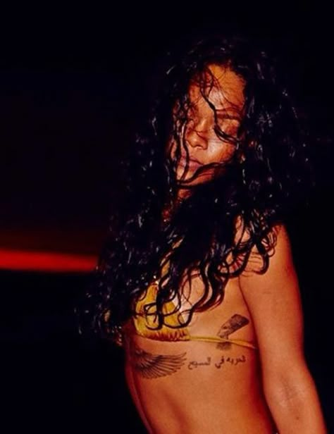 19 Magnificent Tattoos Sported by Rihanna And What They Mean Rhianna Tattoos, Rihanna Tattoo, Rihanna Instagram, Tattoos And Their Meanings, Mother Son Tattoos, S Tattoos, Glyph Tattoo, One Word Tattoos, Literary Tattoos