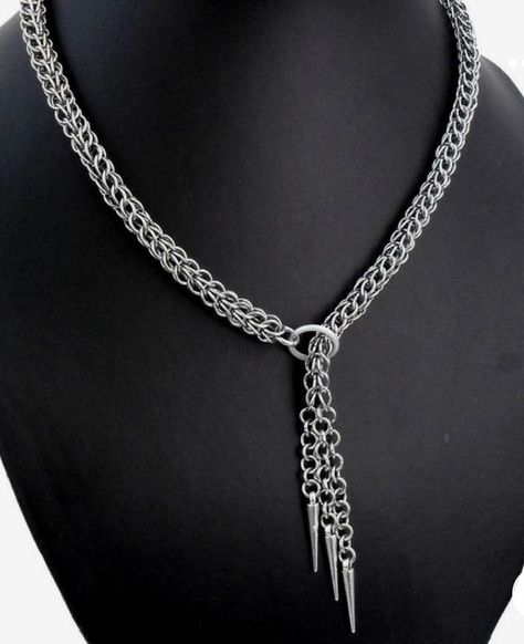 "A lariat style necklace made with a gorgeous Full Persian chainmail pattern, ending with three dangling chains holding metal spikes. From O-ring to spikes, the necklace measures 32\" long, allowing it to be adjustable to your preference. Great for almost any outfit!" Chain Maille Necklace Patterns, Chainmail Harness, Chainmail Outfit, Chainmail Clothing, Chain Maille Necklace, Chain Necklace Diy, Chainmaille Jewelry Patterns, Chain Maille Patterns, Chainmail Patterns