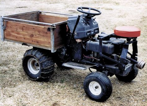 I made this wood hauler from an old riding lawn mower. The box trips to dump the wood. Works great and I can take it right out into the woods. (Larry Zenz, 5779 E. Hwy. 28, Parks, Ark. 72950) &nb... Old Lawnmower Ideas, Motorized Wheelbarrow, Powered Wheelbarrow, Yard Tractors, Lawn Mower Trailer, Lawn Mower Repair, Homemade Tractor, Tractor Idea, Lawn Mower Tractor