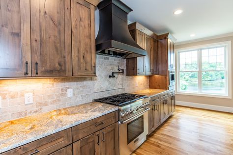 Knotty Alder Kitchen Cabinets Stains, Kraftmaid Kitchen Cabinets Colors, Stained Hickory Kitchen Cabinets, Stained Alder Cabinets, Rustic Alder Kitchen Cabinets, Rustic Alder Kitchen, Kitchen With Brown Cabinets, Knotty Alder Kitchen Cabinets, Knotty Alder Kitchen