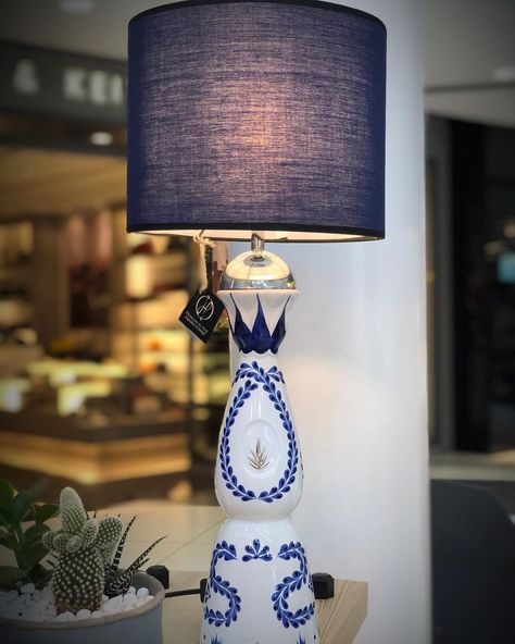 Francois El Hajj on Instagram: “Upcycled customized Clase Azul Reposado Tequila white ceramic, hand painted decanter lighting bottle with unique navy shade to add an…” Tequila Bottles Decoration, Clase Azul Bottle Ideas, Clase Azul Tequila Bottle Ideas, Painted Tequila Bottle, Clase Azul Bottle Decor, Casa Azul Tequila Bottle Decor, Decanter Lights, Hooper House, Cat Den