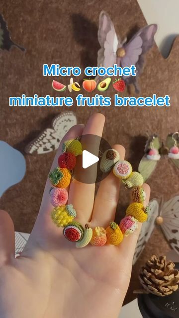 Chrissy on Instagram: "Micro crochet fruits bracelet🍌🍊🍋🍑🍓 #microcrochet #crochetbracelet #fruitbracelet #crochetaccessories #crochetlove #crochetinspiration #crochetgifts" Microcrochet Granny Square, Micro Crochet Jewelry, Crochet Mini Strawberry Bag, Tiny Strawberry Crochet, Micro Crochet Strawberry, Fruit Bracelet, Micro Crochet, Crochet Fruit, Crochet Bracelet