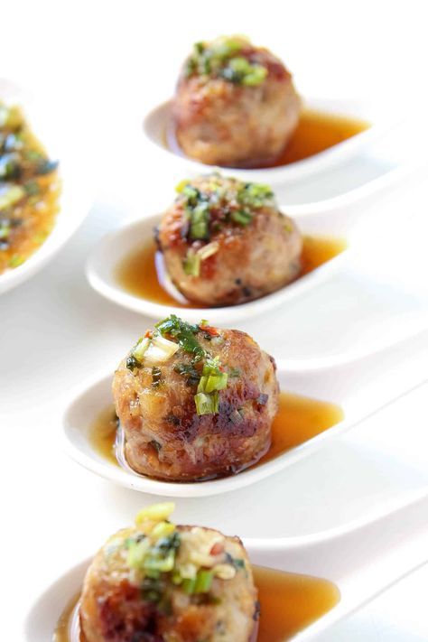 These juicy Thai-style pork meatballs are deliciously flavored with lemongrass, ginger and garlic. As an appetizer these meatballs are amazing with the intensely flavorful dipping sauce, but they also make a great main course. Thai Meatballs, Ground Pork Recipes, Pork Meatballs, Pork Dishes, Party Food Appetizers, Asian Cooking, Asian Dishes, Thai Food, Thai Recipes